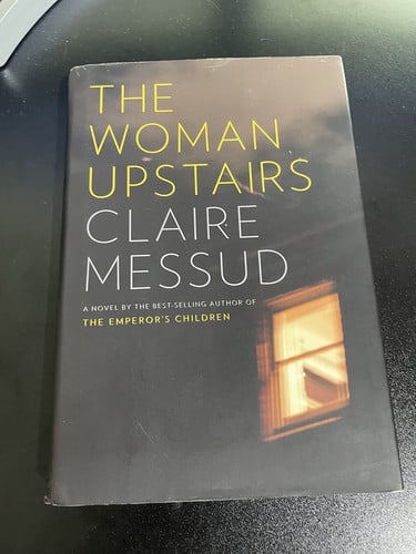 The woman upstairs: a novel