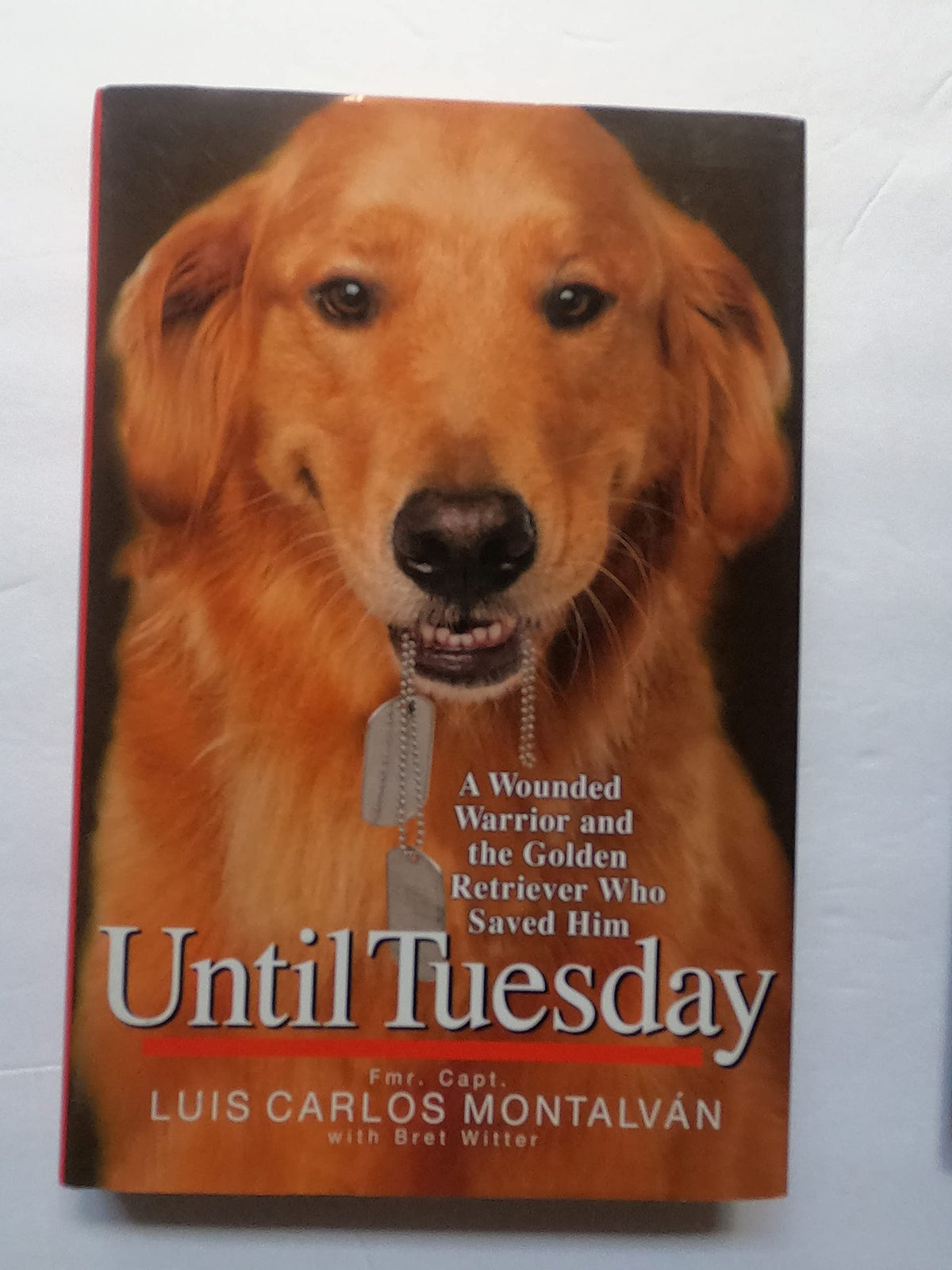 Until Tuesday: A Wounded Warrior and the Golden Retriever Who Saved Him