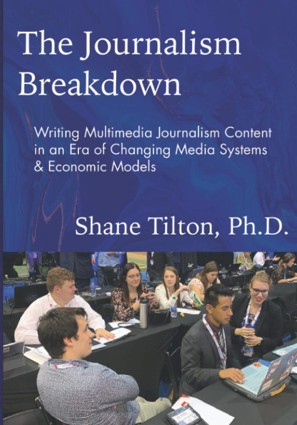 The Journalism Breakdown: Writing Multimedia Journalism Content in an Era of Changing Media Systems & Economic Models