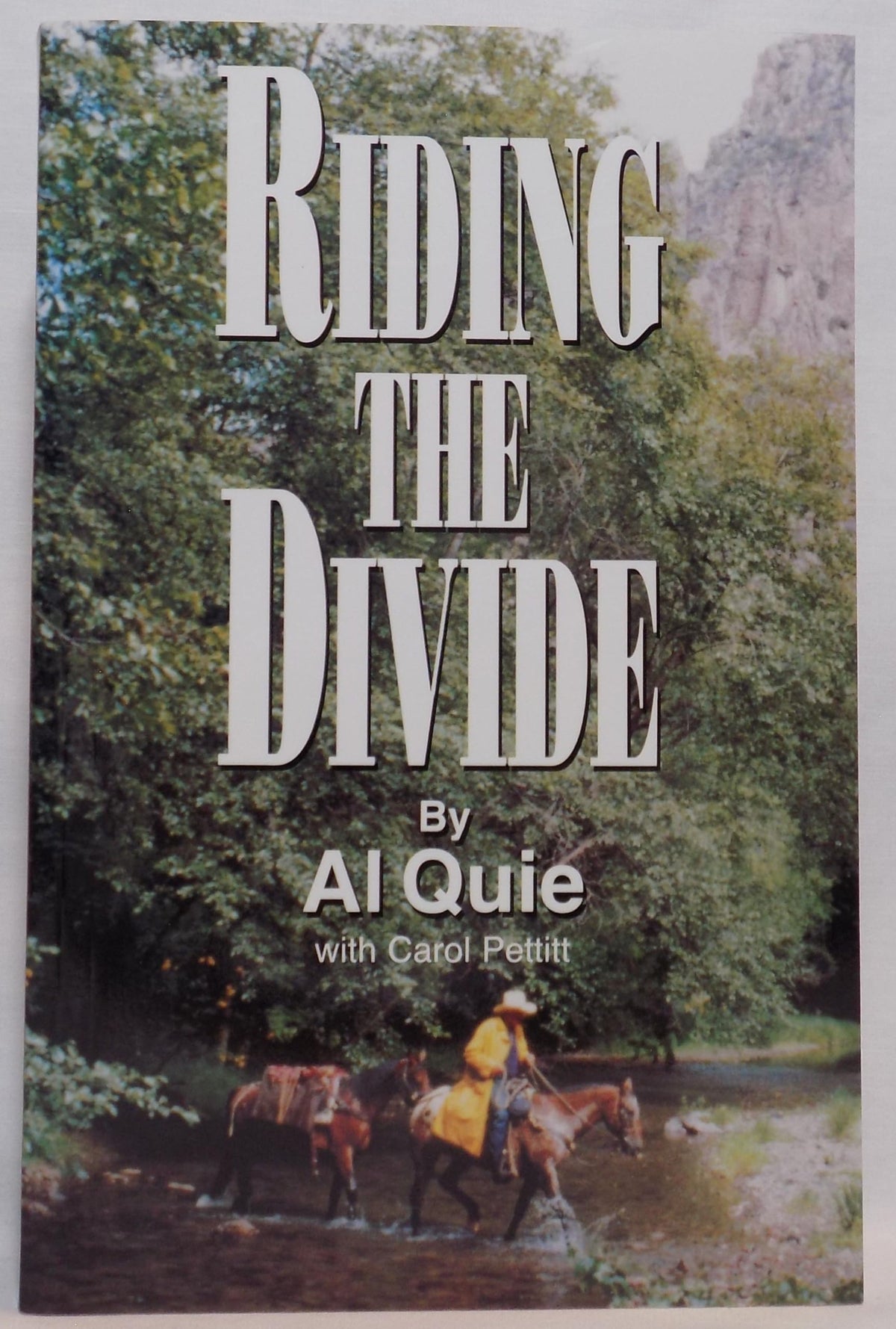 Riding the Divide: Riding Horses, Relating to People, Reminiscing about Life, Revering God's Creation, With a Little Theology Thrown in for Good Measure