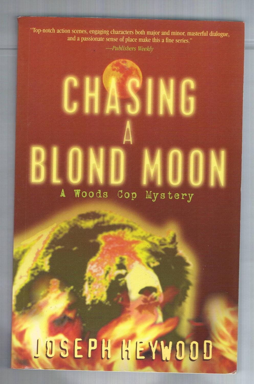 Chasing A Blond Moon: A Woods Cop Mystery