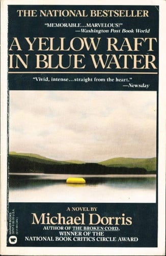 A yellow raft in blue water