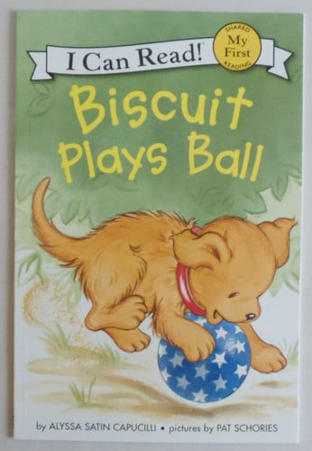 Biscuit plays ball